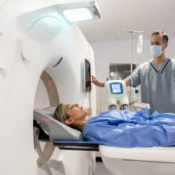 Woman getting a CT scan for an otosclerosis diagnosis