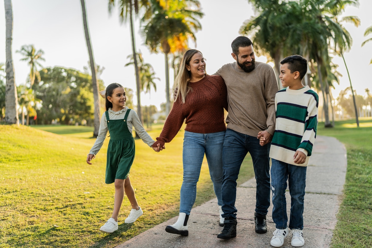 Family takes a walk and chats