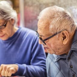 Man with hearing aids goes to a restaurant